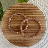 Perzik Maansteen kogelarmband 6mm dames