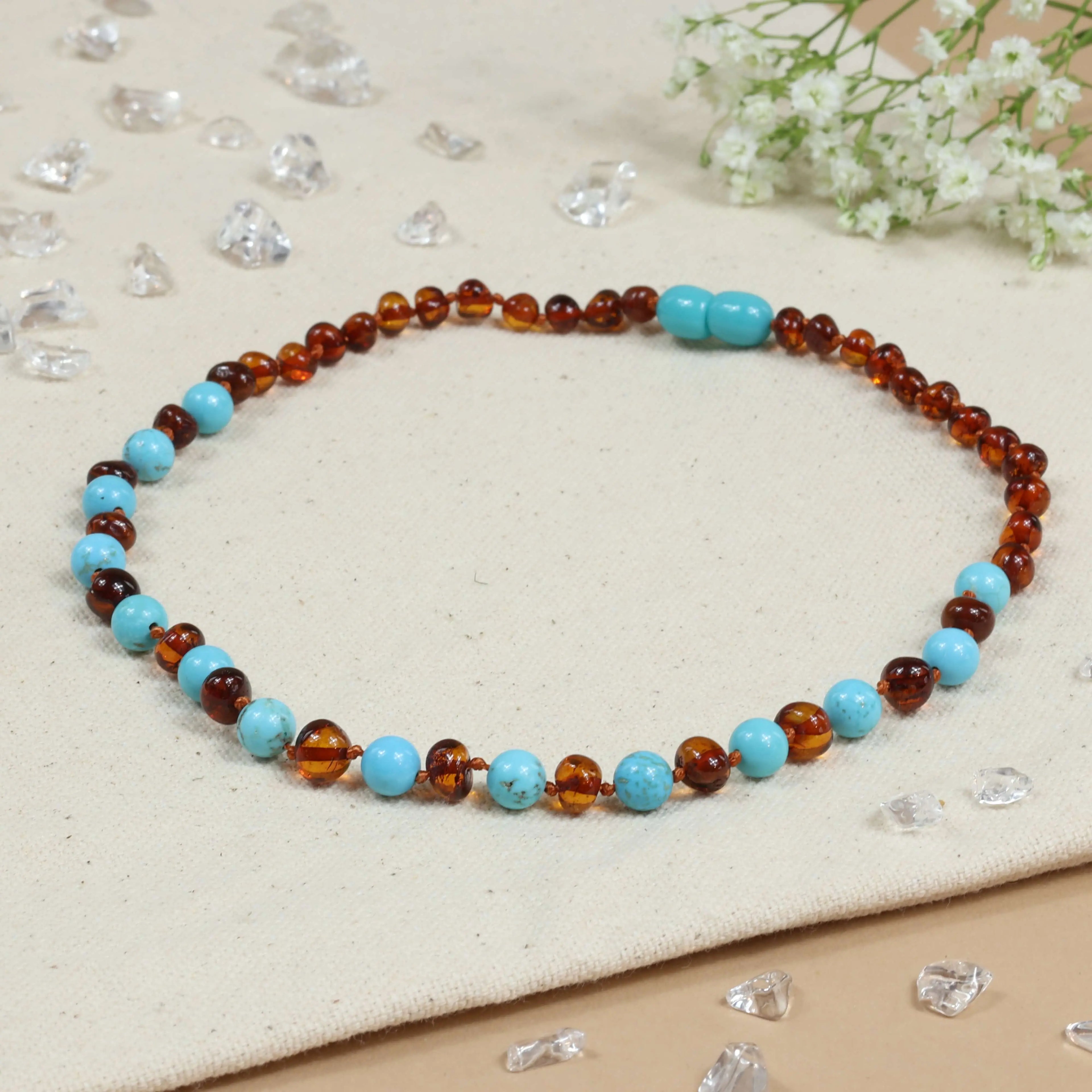 Barnsteen ketting baby/peuter Cognac/Turquoise