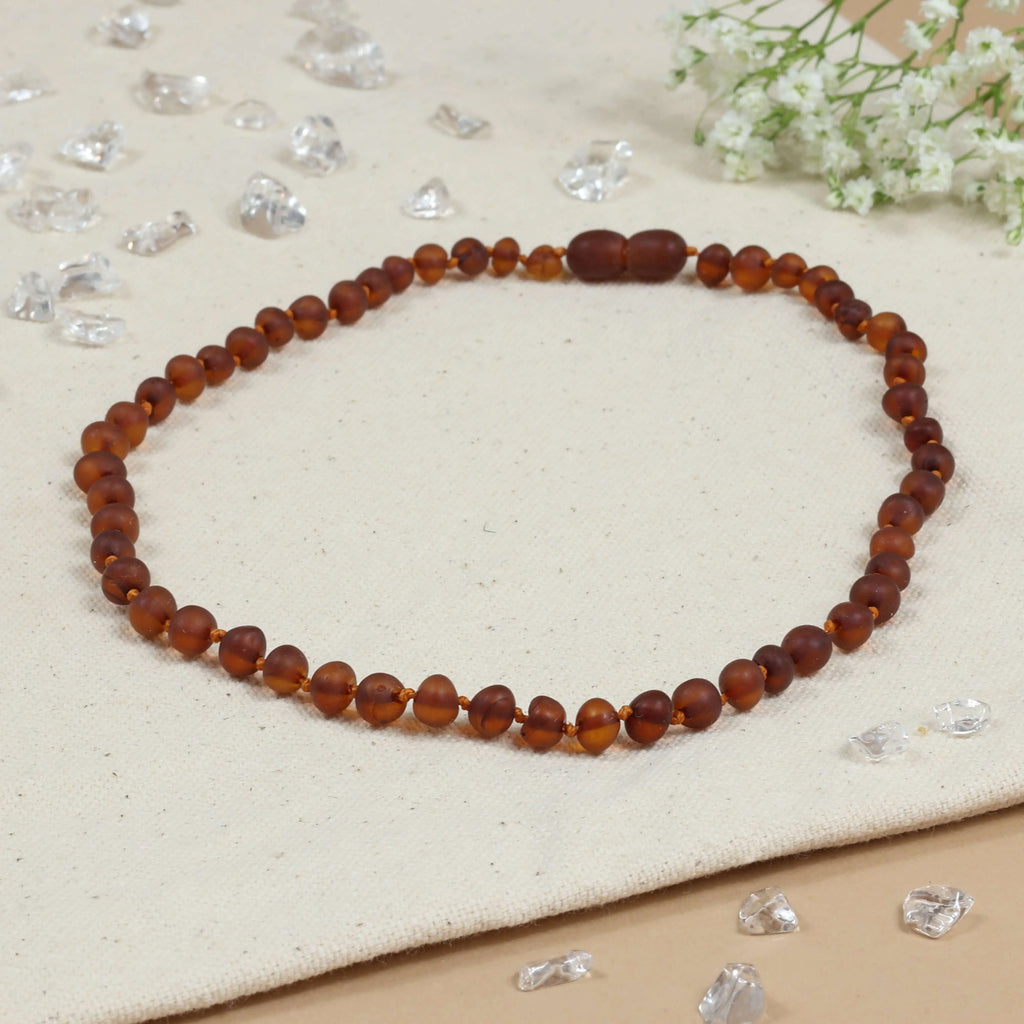 Barnsteen ketting baby/peuter cognac - unpolished
