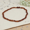 Barnsteen ketting baby/peuter cognac - unpolished